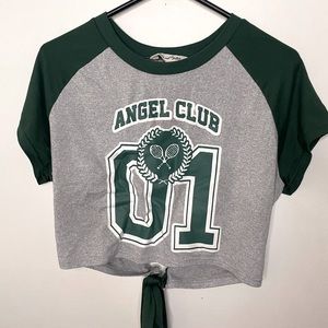 Short sleeve top with the back out.  Size xl, color gray and green